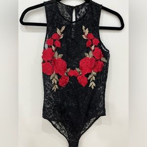Black/red lace bodysuit. Size small.